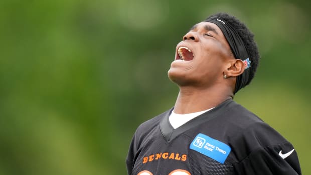 Jul 28, 2023; Cincinnati, Ohio, USA; Cincinnati Bengals cornerback Cam Taylor-Britt (29) reacts after a defensive play during training camp at the practice fields next to Paycor Stadium. Mandatory Credit: Kareem Elgazzar/The Cincinnati Enquirer-USA TODAY Sports  